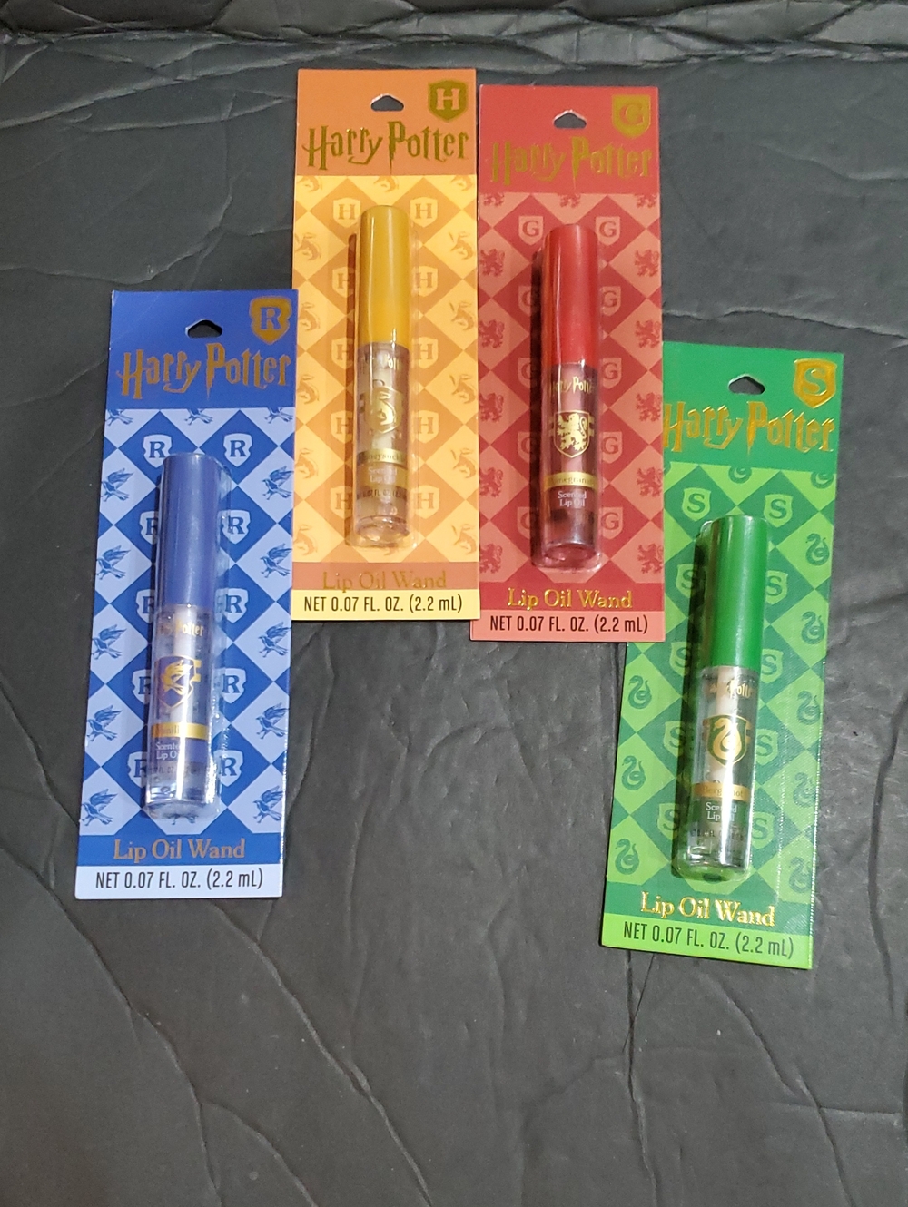 Harry Potter 4pack scented lip oil wand brand new